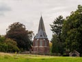 Church behind golf course Royalty Free Stock Photo