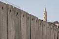 Church behind Israeli separation wall Royalty Free Stock Photo