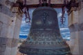 Church Bell close-up on wooden beams and iron holders Royalty Free Stock Photo