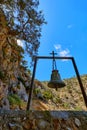 Church bell of lost Orthodox church of St John the Hermit in hills, Akrotiri, Crete, Greece. Upshot at daytime in spring Royalty Free Stock Photo