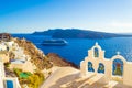 Church bells cruise ship Oia town Santorini Caldera Greece Royalty Free Stock Photo