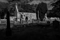 Church of the Blessed Peter in Duffus, Scotland on a sunny day in grayscale
