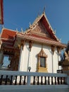 Church of Buddhist temple isolated on blue sky background closeup. Royalty Free Stock Photo