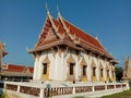 Church of Buddhist temple isolated on blue sky background closeup. Royalty Free Stock Photo