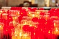 Church burning candles in glass candlesticks