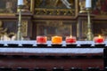 Church burning candles in glass candlesticks in the Cathedral.