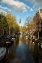 Church and canal in Amsterdam Royalty Free Stock Photo