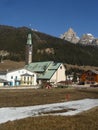 Church in Canazei Val di Fassa Italy Alps landscape Royalty Free Stock Photo