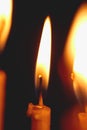 church candle burning in the dark creates a spiritual atmosphere Royalty Free Stock Photo