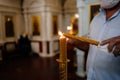 Church candles are lit during a service or prayer. Royalty Free Stock Photo