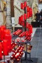 Church candles in red chandeliers Royalty Free Stock Photo