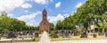 Church with cemetery surrounded by big trees