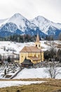 Church with cemetery in Zdiar village with Belianske Tatry mount