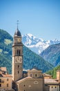 Church of Cogne, Monte Bianco Mont Blanc in the background, Grand Paradiso National park, Aosta Valley in the Alps Italy Royalty Free Stock Photo