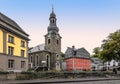 Church and colorful buildings in city center of Monschau, Germany. Royalty Free Stock Photo