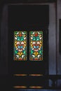 Church coloured stained glass in the dark