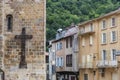 Church cross and houses in the Villa de Foix near the Pyrenees and Andorra. Ariege France Royalty Free Stock Photo