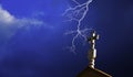 Church cross with lightning Royalty Free Stock Photo