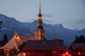 Church Dawn Alps mountains France, snowy peaks in fog, summer sunset Chamonix Mont Blanc France