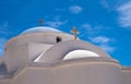 White orthodox greek church with cross on clear blue sky background Royalty Free Stock Photo