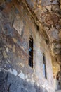 Church of Dormition with colorful medieval frescos in Vardzia cave monastery complex, Georgia. Inside view of stone chapel