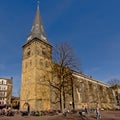 Church of Enschede, the Netherlands with many people and bicycles around