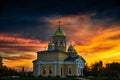 Church in the evening, beautiful dark sky and clouds at sunset Royalty Free Stock Photo