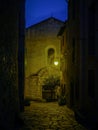 Church facade in the evening with a single external light fixture