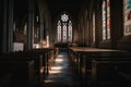 A church filled with wooden pews and stained glass windows. Generative AI image. Royalty Free Stock Photo