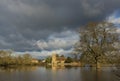Church and flooded fields with reflexions near Tewkesbury. Royalty Free Stock Photo