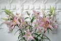 Church flower display of pink lilies