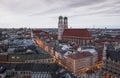 Church Frauenkirche and shopping street at Marienplatz in Munich during sunset, Germany