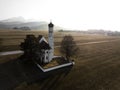 Church in front of foggy hills at sunset Royalty Free Stock Photo