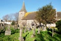 Church and grave yard with holly tree in Hove, East Sussex, United Kingdom