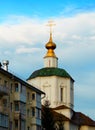 Church with green roof and golden dome architecture background