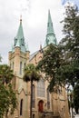 Church with Green Steeples and Red Doors Royalty Free Stock Photo