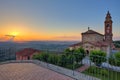 Church and hills of Langhe at sunset.