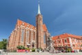 Church of the Holy Cross and St Bartholomew and statue of John of Nepomuk in Wroclaw, Poland