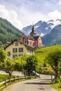 Church, house, mountain road in the mountains. Royalty Free Stock Photo