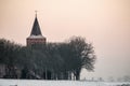 Church and houses of a small village behind the Royalty Free Stock Photo