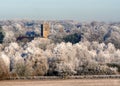 Church in the icy white Winter trees. Refuge or safety. Royalty Free Stock Photo