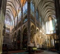 a church with an interior full of windows and altars