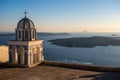 Church and Kameni volcano in Santorini