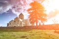 Church, located Racha region of Georgia, lower Svaneti mountains. Sun flare Royalty Free Stock Photo