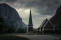 Church in Lysebotn surrounded by mountains in Norway