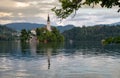 The Church of Mary the Queen, located on an island in Lake Bled at amazing sunset time Royalty Free Stock Photo