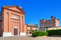 Church and medieval castle in small italian town. Royalty Free Stock Photo