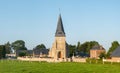 The church in the middle of the traditional French village of Saint Sylvain in Europe, France, Normandy, Seine Maritime, in summer