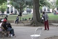 A church minister preaching to homeless men and w