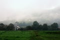 Church in mist near Bajina Basta, Serbia